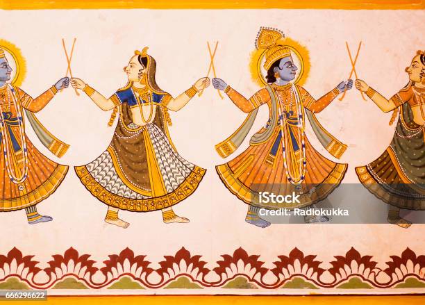 Hindu Gods Dancing On A Fresco With Colorful Paints On Carved Wall Of 19th Century House In India Stock Photo - Download Image Now