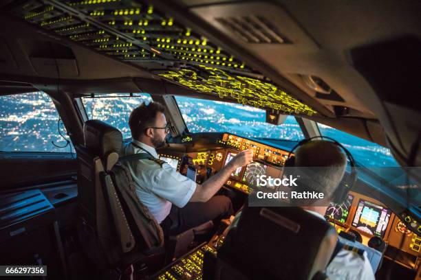 Flightdeck View Stock Photo - Download Image Now - Pilot, Cockpit, Commercial Airplane