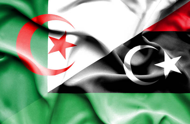 Waving flag of Libya and Algeria