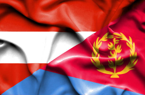 istock Waving flag of Eritrea and Austria 666301864