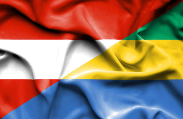 istock Waving flag of Gabon and Austria 666301944