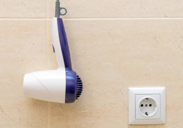 istock Hotel bathroom with hair dryer 666306488