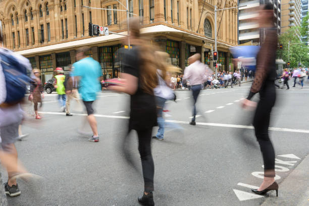 istock People crowd crossing street in central Sydney 666311702