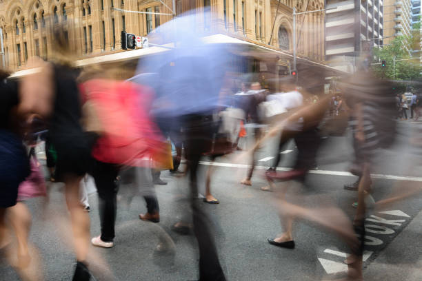 istock People crowd crossing street in central Sydney 666311788