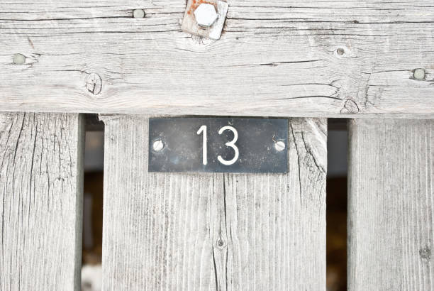 istock Number 13 on a wooden pier 666314592
