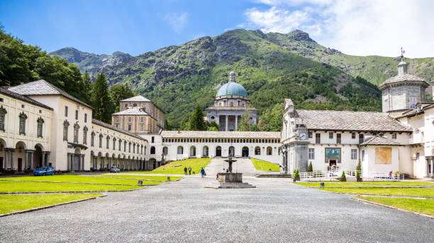 Oropa, Piedmont, Italy-25 June 2016. The famous Sanctuary of Oropa it's located in the province of Biella, among the magical scenery of the Piedmont mountains. Oropa, Piedmont, Italy-25 June 2016. The famous Sanctuary of Oropa it's located in the province of Biella, among the magical scenery of the Piedmont mountains, is visited every year by thousands of pilgrims. shrine stock pictures, royalty-free photos & images