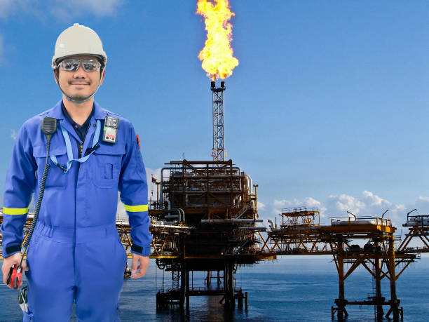 istock Working engineer at offshore oil and gas refinery 666318586