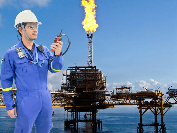 istock Working engineer at offshore oil and gas refinery 666318592