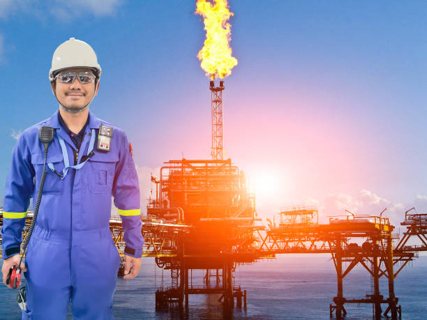 istock Working engineer at offshore oil and gas refinery 666318598