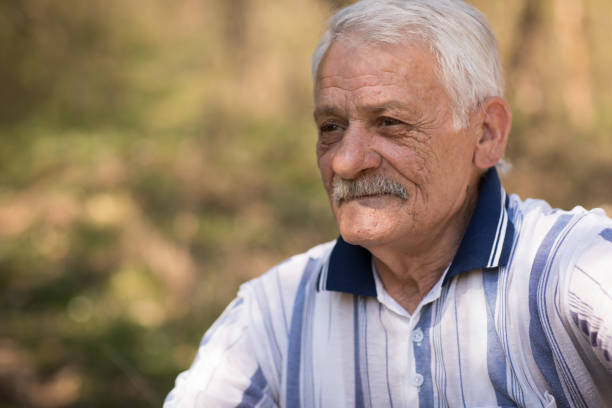 istock Senior caucasian man relaxing in nature 666323284