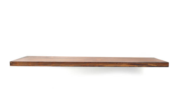 istock wooden shelf at wall background 666326020