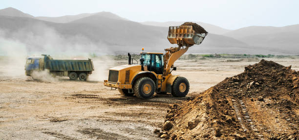 istock Earthwork, working machinery on a summer day 666329938