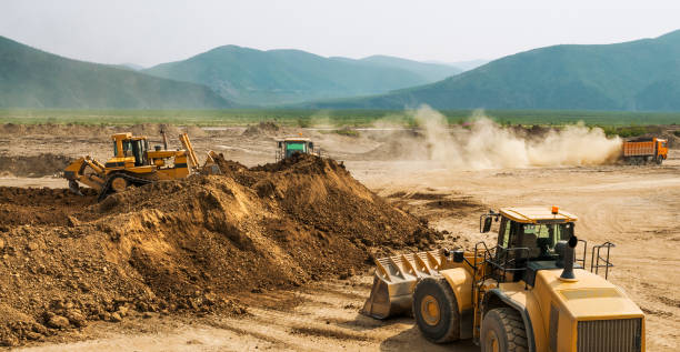 istock Earthwork, working machinery on a summer day 666329958