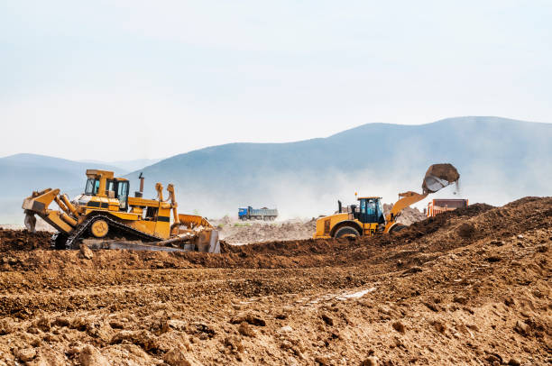 istock Earthwork, working machinery on a summer day 666329964