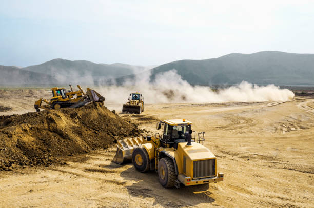 istock Earthwork, working machinery on a summer day 666329972