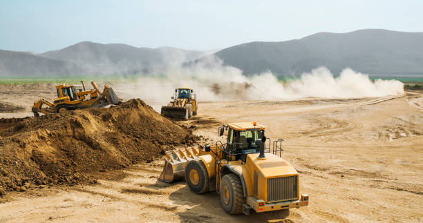 istock Earthwork, working machinery on a summer day 666329990