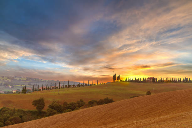 istock colorful sky at sunset in Tuscany 666332674