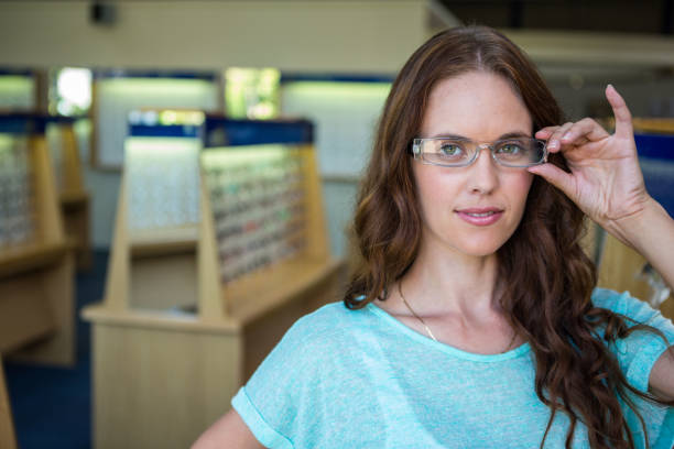 istock Woman shopping for new glasses 666333022