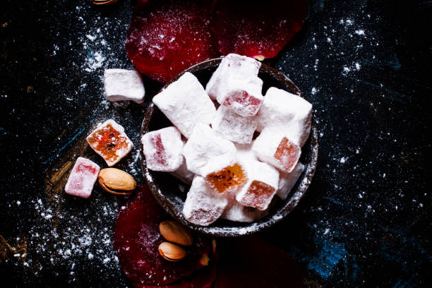 istock Eastern sweets with sugar powder, pistachios and rose petals 666339740