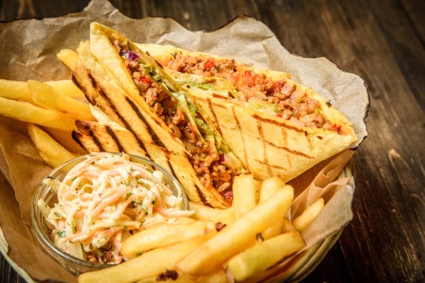 istock Close up shot of grilled burritos 666342682