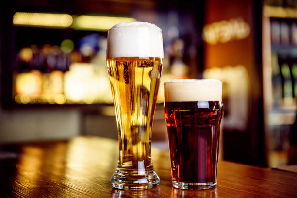 istock Dark and light beer in bar 666342868
