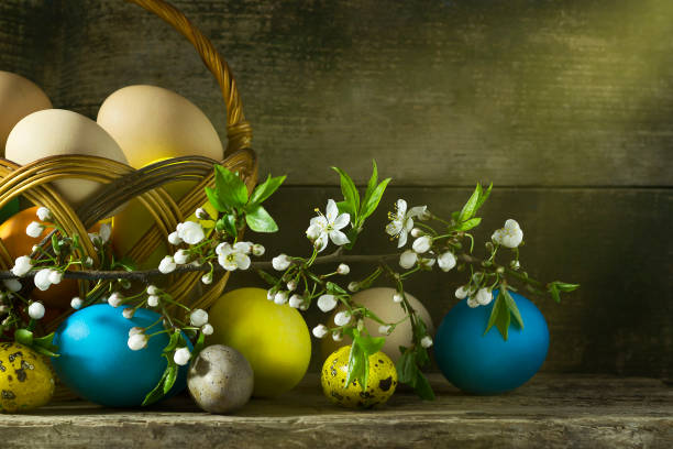 istock Easter still life with colorful eggs on an old wooden background 666343478