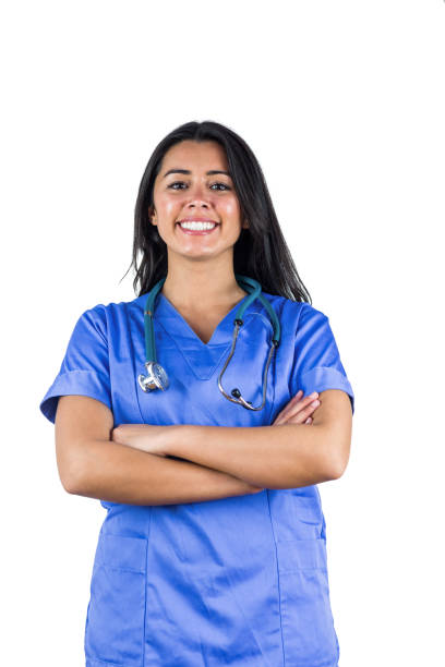istock Smiling doctor with her arms folded 666343674