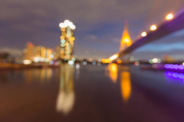 istock Blurred bokeh office building and suspension bridge 666346888