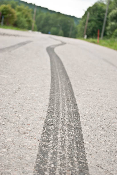 istock Trail of skid marks 666347150