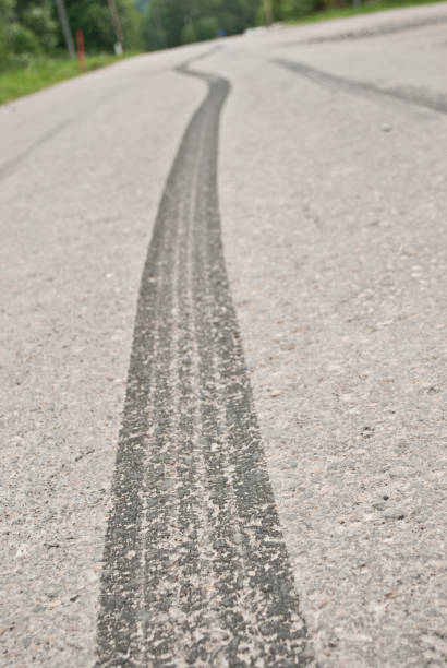 istock Trail of skid marks 666347404