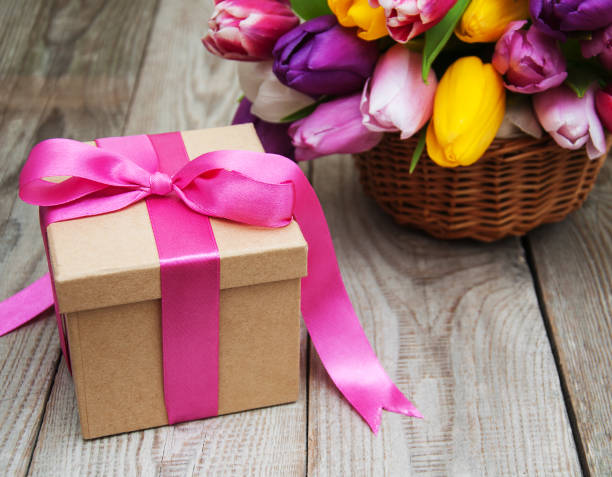 istock Spring tulips flowers and gift box 666350260