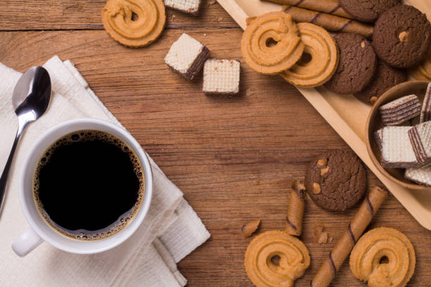 istock black coffee in white cup with cookie and dessert 666356254