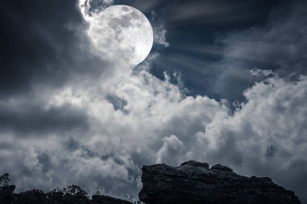 istock Boulder against sky with clouds and beautiful full moon. Outdoors. 666361418