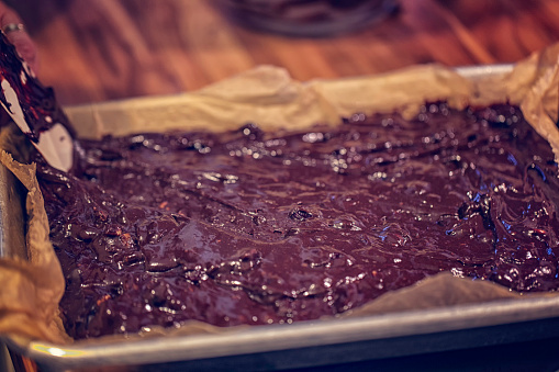 Preparing Homemade Chocolate Brownies in domestic kitchen