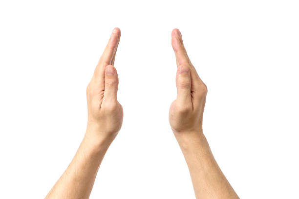 istock Man hand's measuring invisible item. Isolated on white 666362410