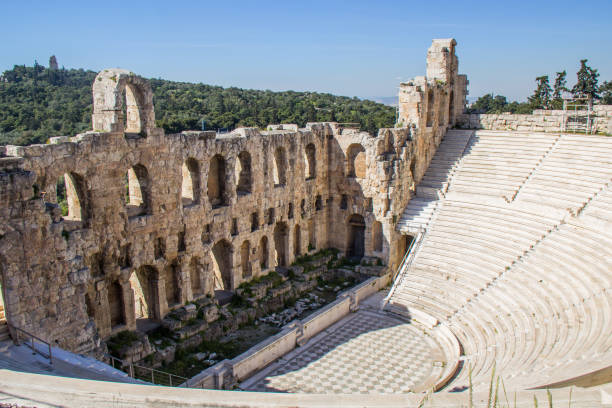 Odeon of Herodes Atticus The Odeon of Herodes Atticus is a stone theatre structure located on the southwest slope of the Acropolis of Athens, Greece. The building was completed in 161 AD and then renovated in 1950. cultura grega stock pictures, royalty-free photos & images