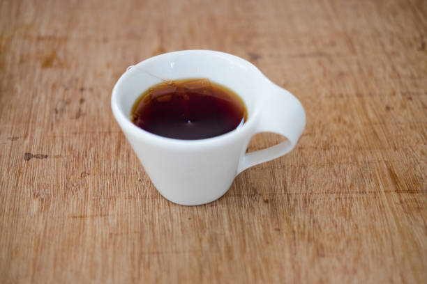 istock Hot tea in a cup on a wooden table 666364480
