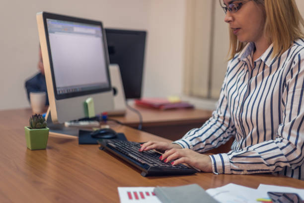 istock Businesswoman working on computer at office 666366118