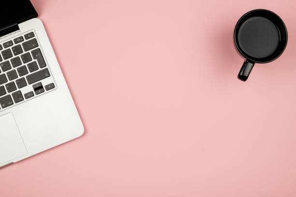 istock Creative design mockup set of workspace desk with cup of coffee and notebook. Copy space colored background 666366708