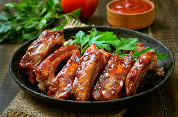 istock Grilled sliced pork ribs in frying pan 666367720
