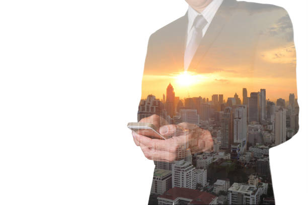 istock Business man hand hold smart phone, mobile, city and sunset. 666368302