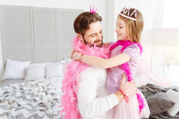 istock Positive delighted girl embracing her father 666369006