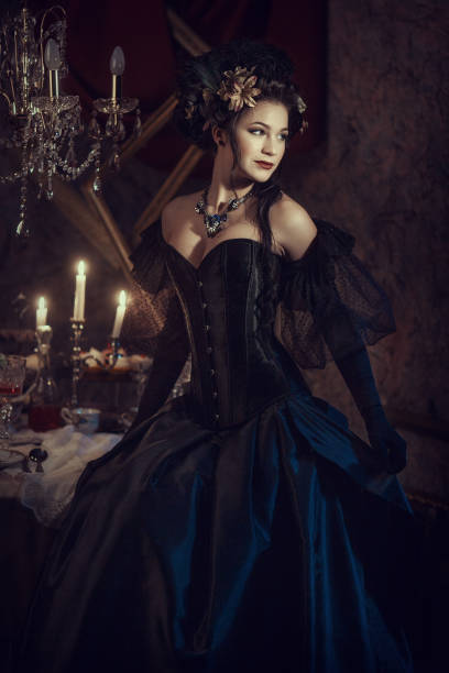istock Woman in black rococo dress 666370682