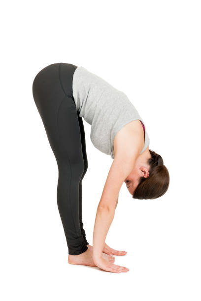Yoga woman gray_Pada Hastasana_Step3 stock photo