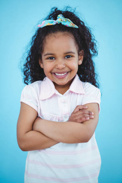 istock Cute girl with arms crossed 666372918