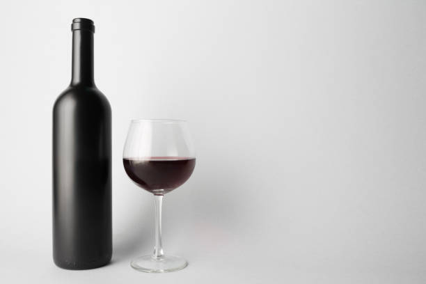istock Front view of the wine bottle and wine glass 666374752