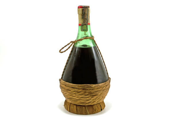 Old whiskey in beautiful bottle on white background.