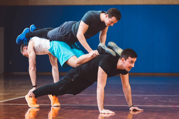 istock Young group is doing balance and strength exercises 666376322