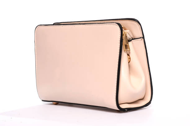 istock Beige lacquered clutch isolated on white 666379308
