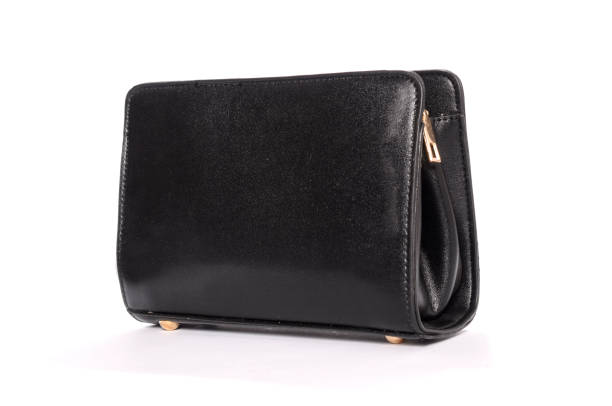 istock Black leather clutch isolated on white 666379322